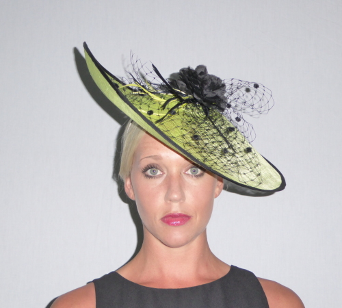 Chic Chapeau in Chartreuse Sinamay. Saucer shaped and set on a headband with black veiling and Biot feathers