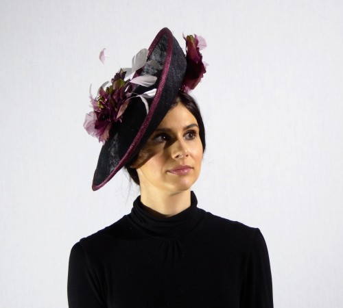 Stunning hatinator in dark grey sinamay edged in wine with matching flowers and feathers.