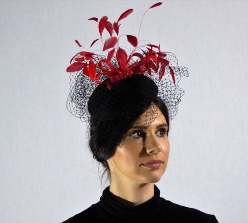 Black felt Button with Black Veiling and Red bows and Feathers.