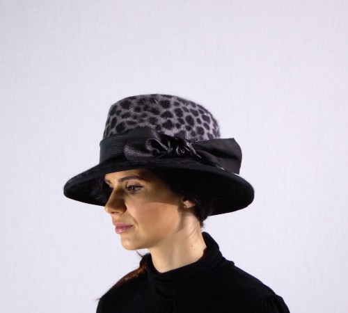 Velour fedora in grey and black animal print with black leather headband.