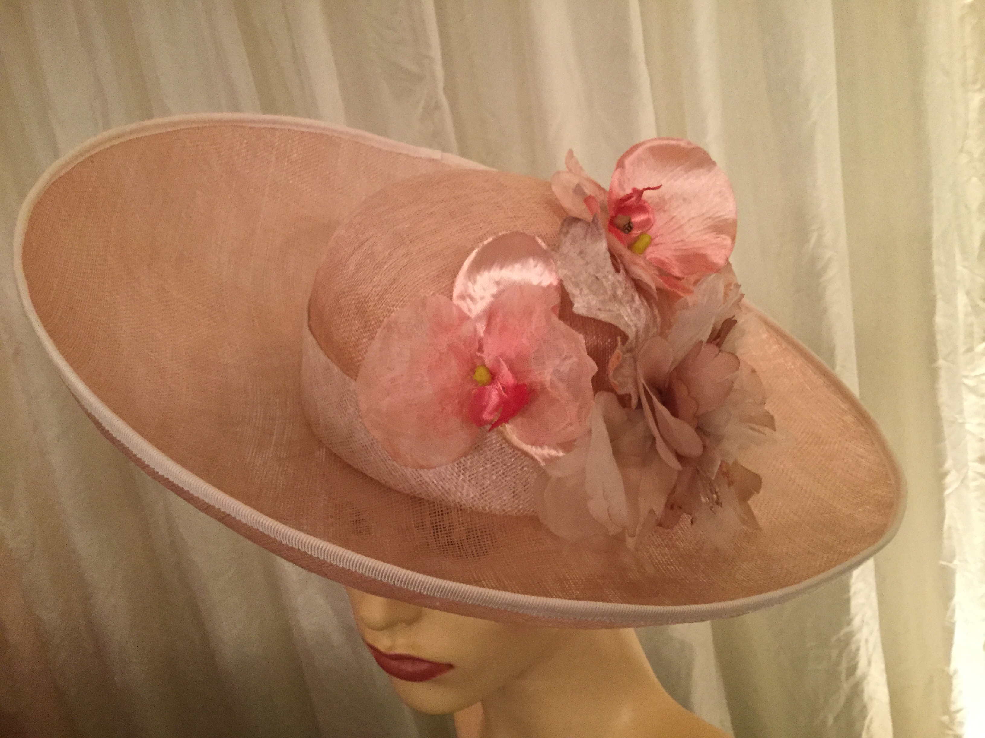 Elegant pink sinamay wide-brimmed hat